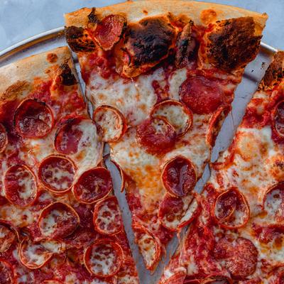 Pepperoni pizza, top view, close-up.