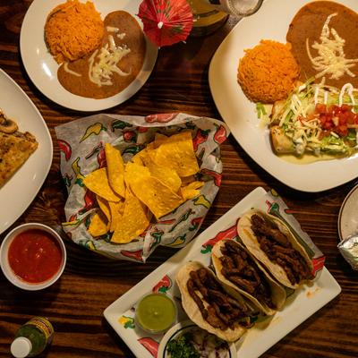 Various items served on a table, top view.