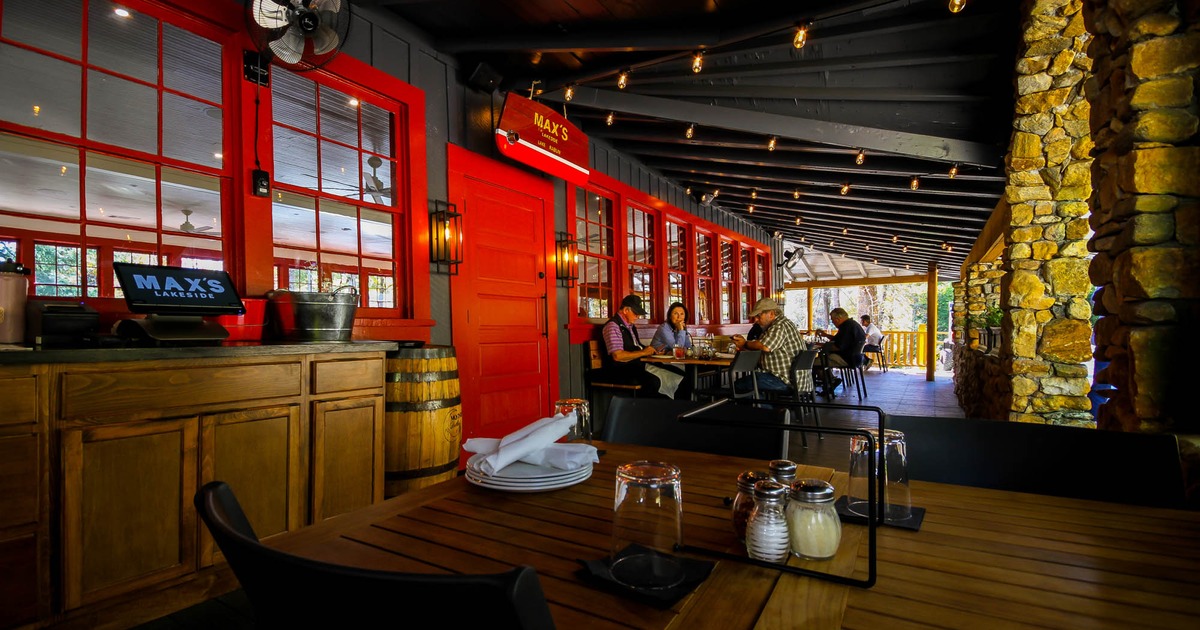 Exterior, terrace, table and chairs, front door to restaurant