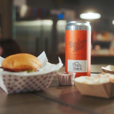 Burger and a can of beer.