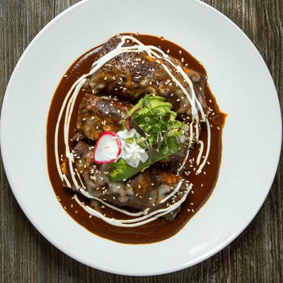 Enmoladas in Mole sauce.