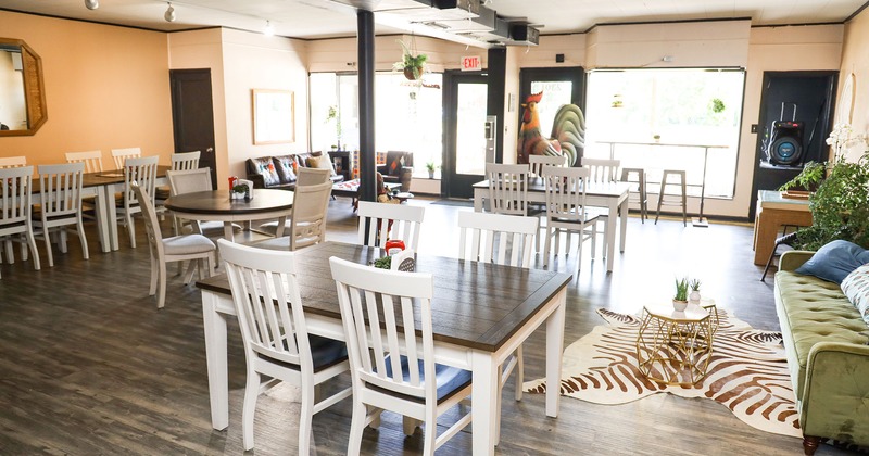 Restaurant interior, seating area with dining tables