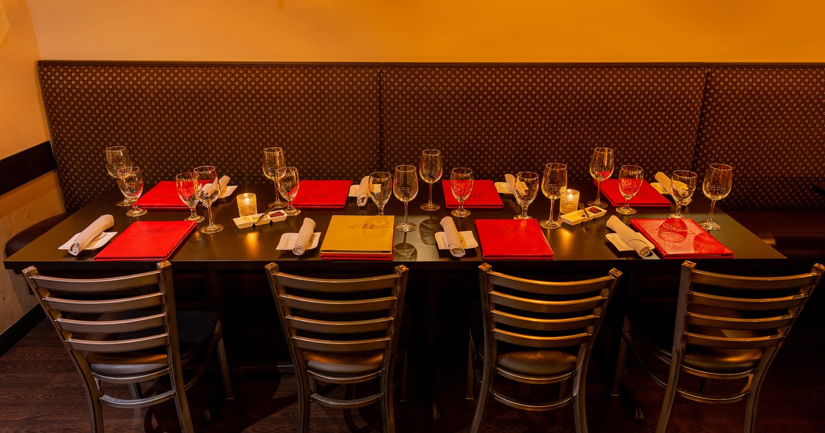 Elegantly set dining table for eight guests