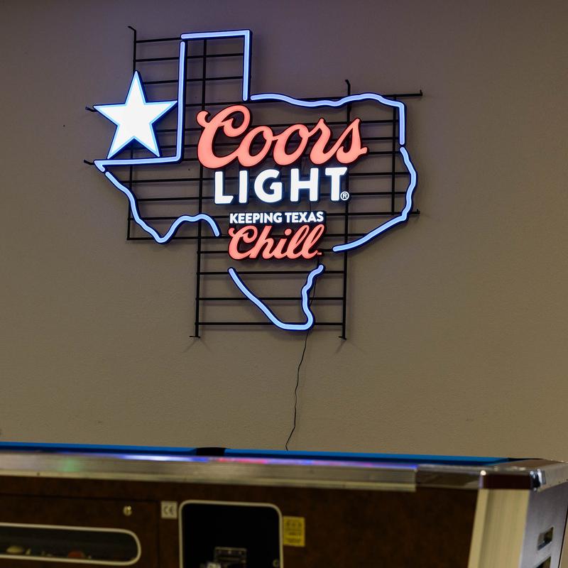 Neon sign in a shape of the state of Texas.