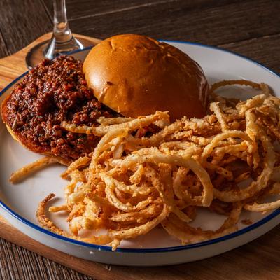 House-Made Sloppy Joe served with onion straws.