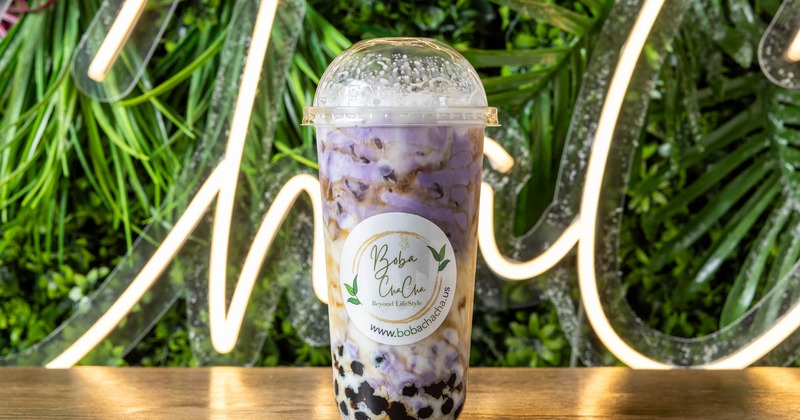 Taro Milk in a branded cup