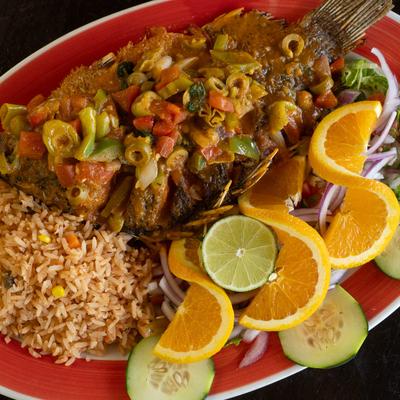 Fried fish, rice, and vegetables.