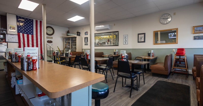 Interior, seating area with tables and chairs