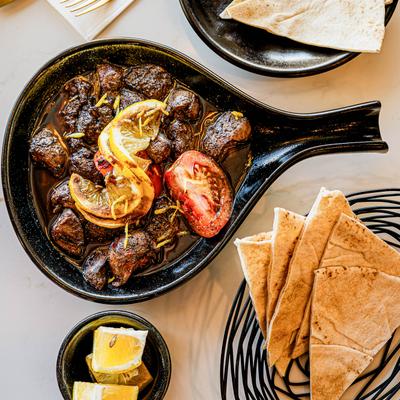 Grape leaf rolls, pita.