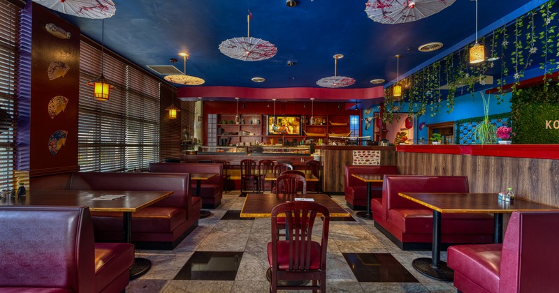 Interior, tables, chairs, booths, wide view