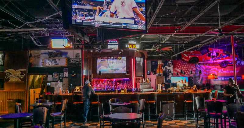 Sport bar interior space, seating area and bar