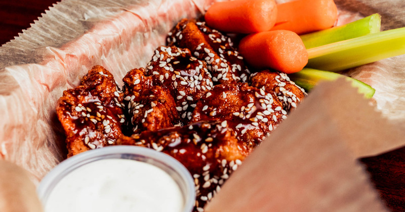 Vegetables, grilled chicken and dip on the side