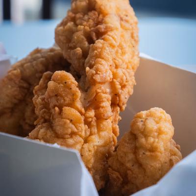 Close-up of fried chicken tenders.
