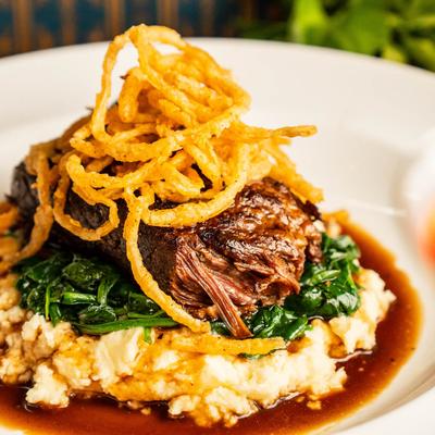 Pot roast with mashed potatoes and onions