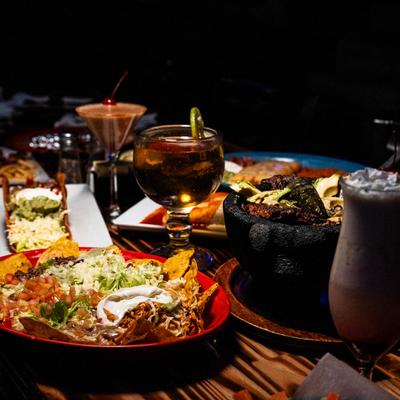 Assortment of food and drinks displayed on table.
