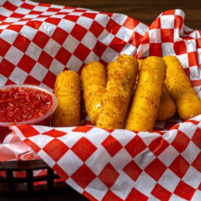 Mozzarella Sticks served with marinara sauce.