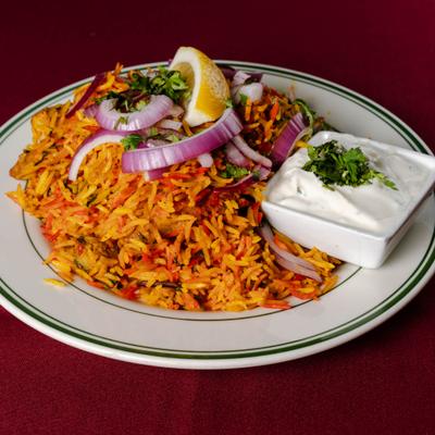 Slow cooked Basmati rice with onion, cilantro, and creamy white sauce.
