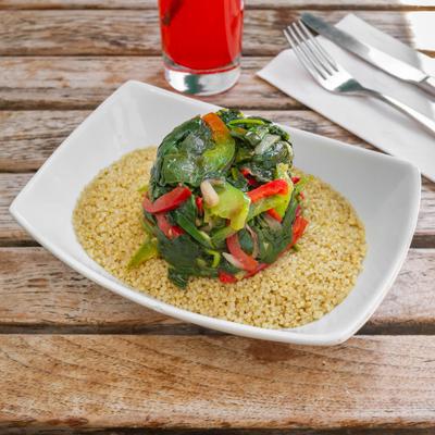 Sauteed spinach, peppers, corn and onion, on a bed of quinoa.
