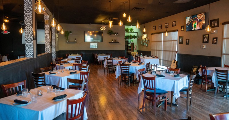 Interior, dining tables ready for guests
