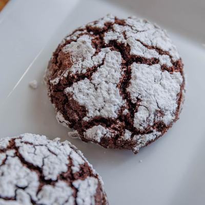 Chocolate Crinkle Cookies, topped with powdered sugar.