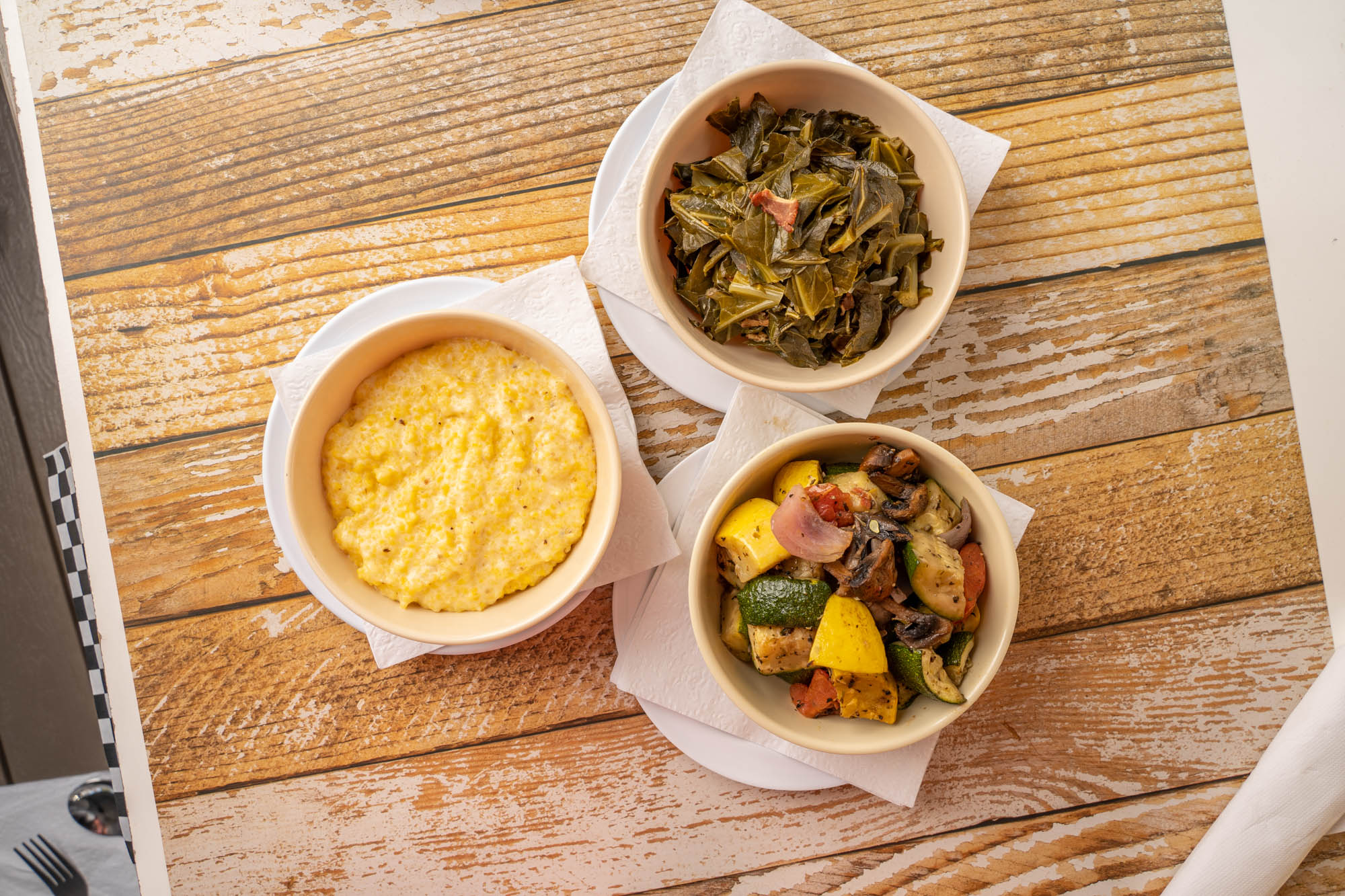 Creamy stone ground grits, collards and roasted veggies, top view