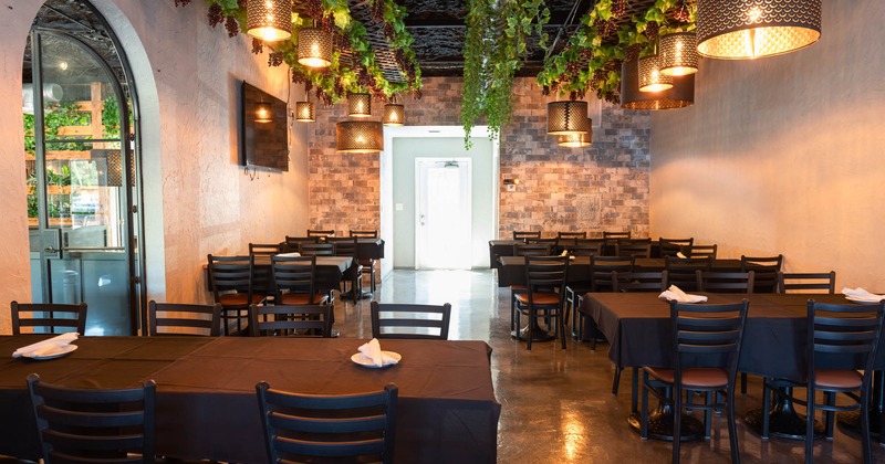 Interior, dining tables waiting for guests