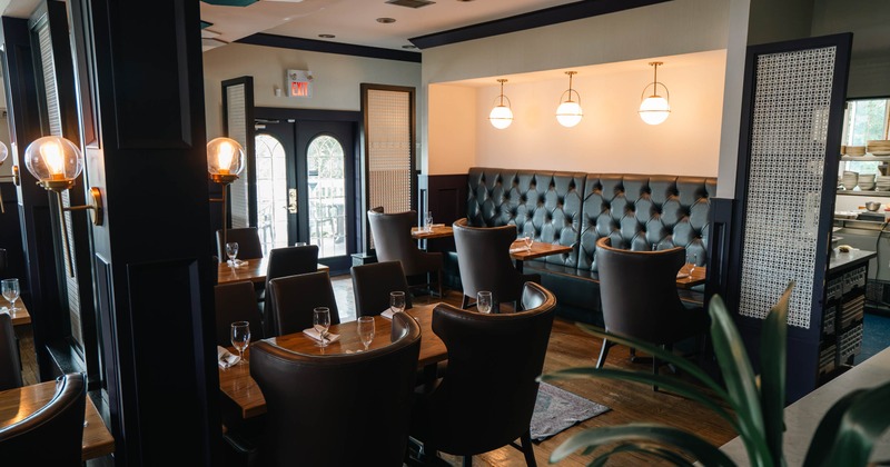 Interior, seating area with cozy sofas, booths and chairs