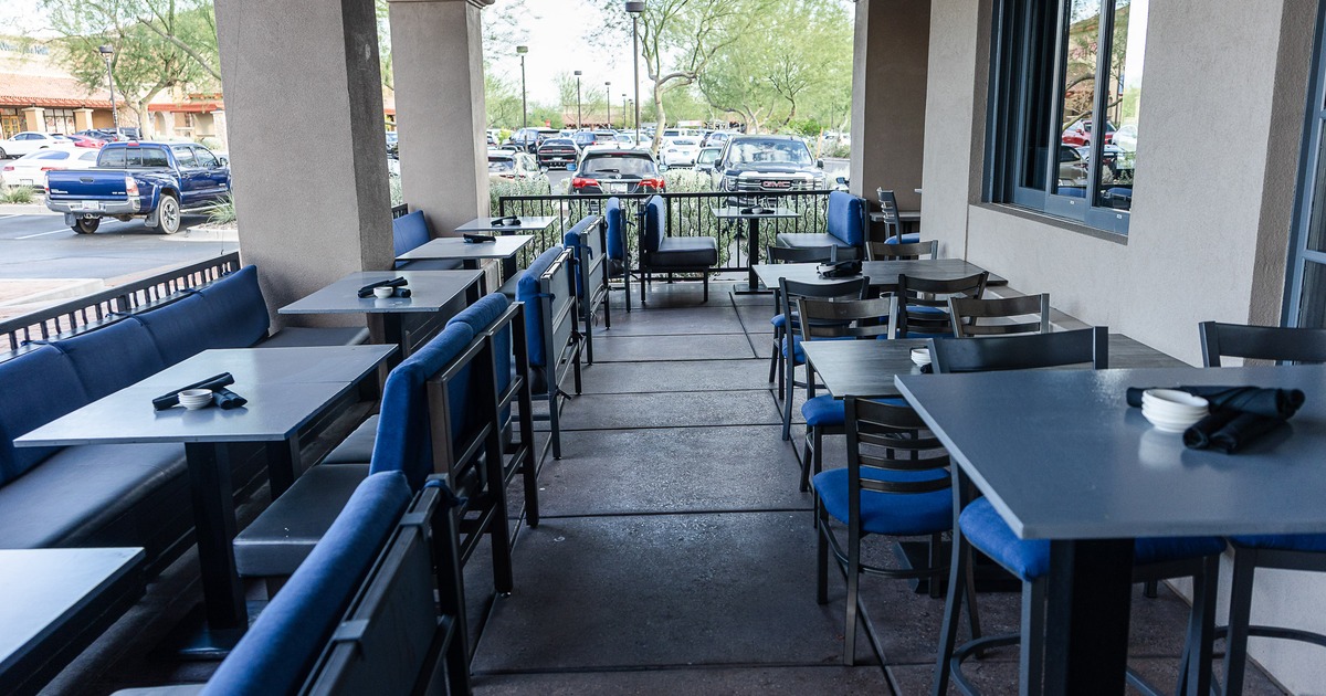 Cozy patio dining area with set dining tables