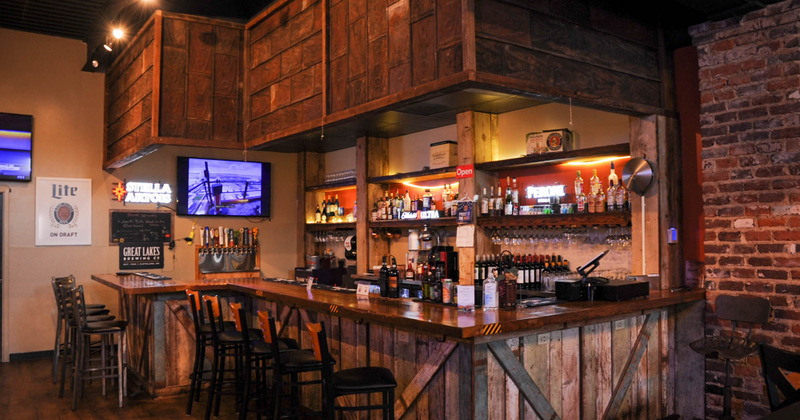 Bar Area - counter, bar stools, TV above