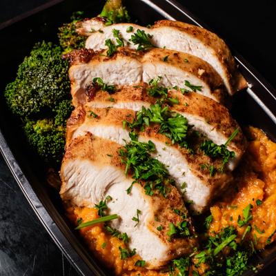 Juicy Chicken with broccoli, rice, and herb seasoning.