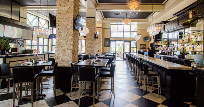 Interior, kitchen counter, dining area and bar