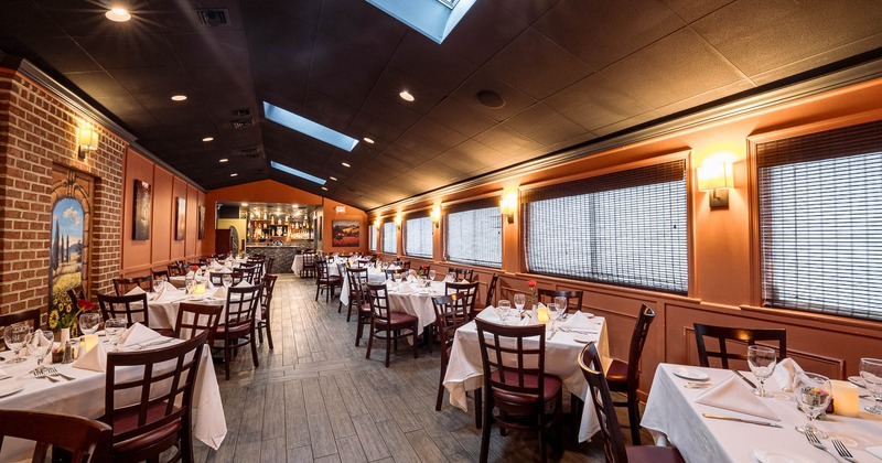 Interior, dining area with tables set for guests