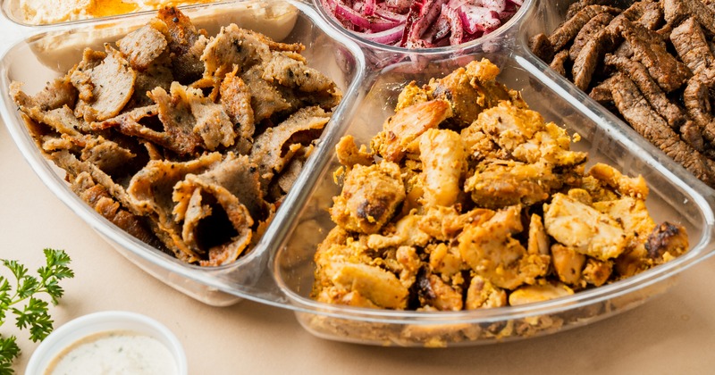 Assortment of Mediterranean dishes spread on the table, overhead view