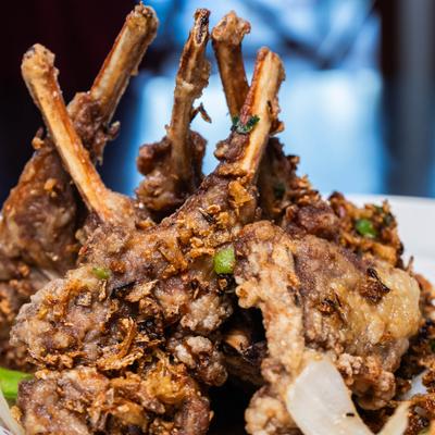 Pan-fried marinated lamb rack.