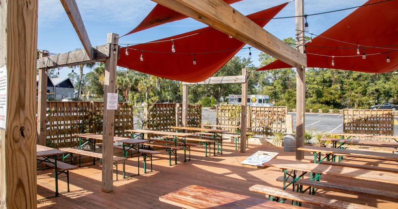 Interior,  patio with guest tables and benches