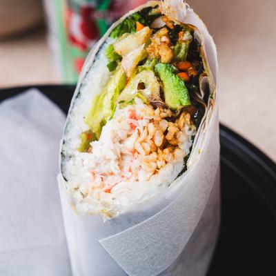 Shrimp tempura wrap, with rice, avocado, crab meat, and veggies.