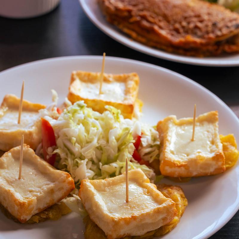 menu item 2 of 5, Tostones Con Queso