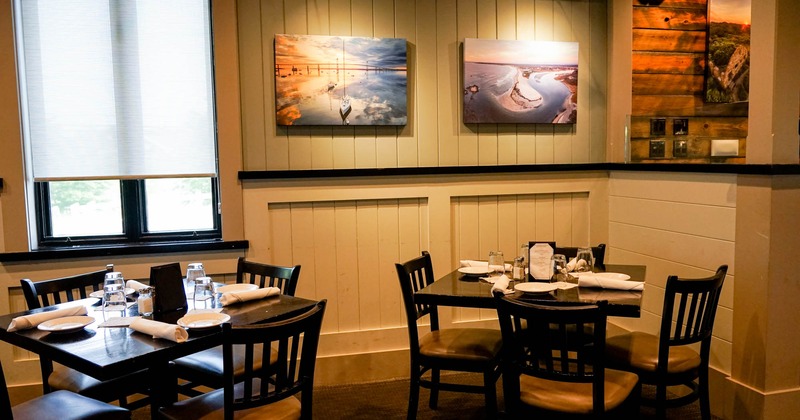 Interior, tables and chairs ready for guests