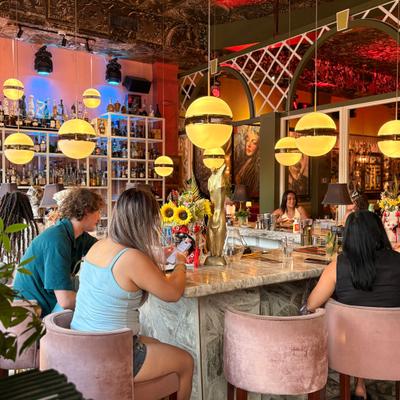 People seated at the bar.