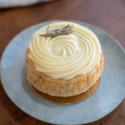 Lemon cake on a bright blue plate.