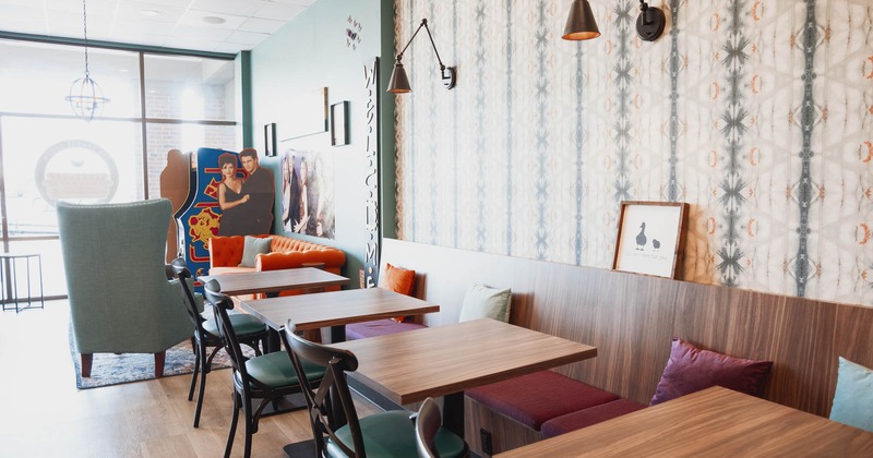 Interior, banquette seating with tables and chairs