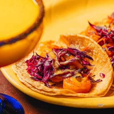 Shrimp tacos with purple cabbage.