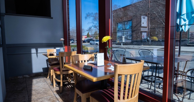 Tables for two guests along the windows