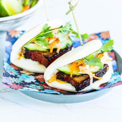 A plate with pork belly buns