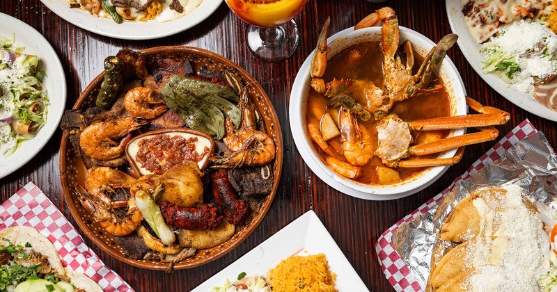 Assortment of food dishes and drinks, overhead view