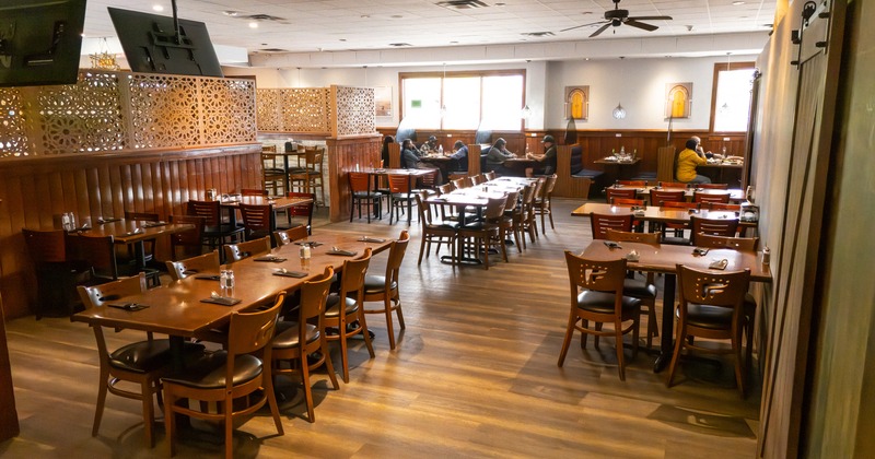 Interior, dining area with tables ready for guests