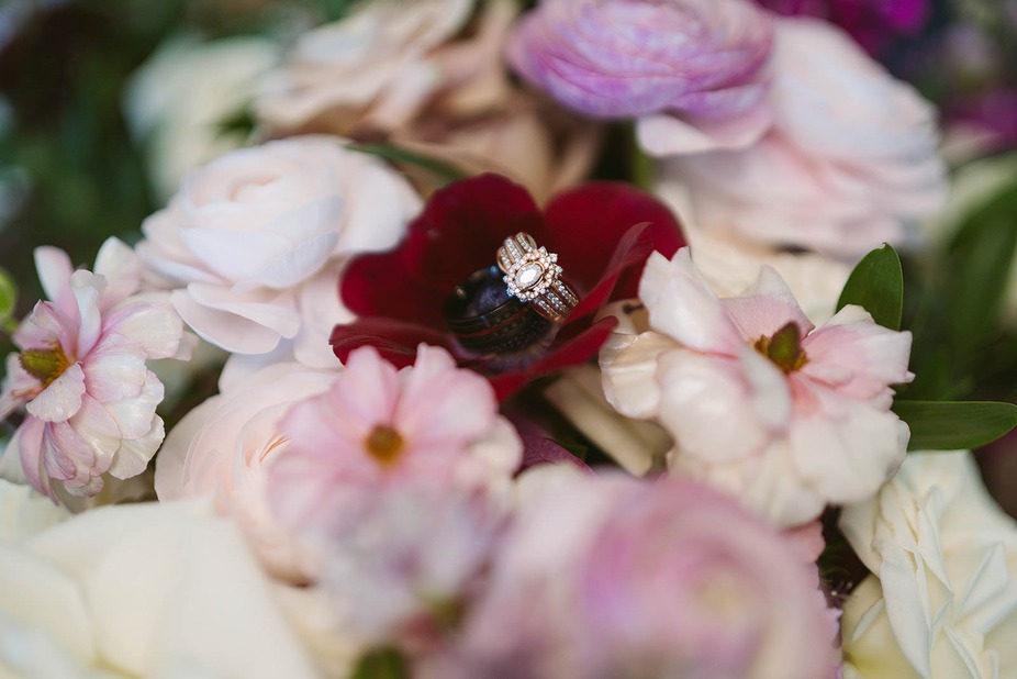Wedding bands in a flower