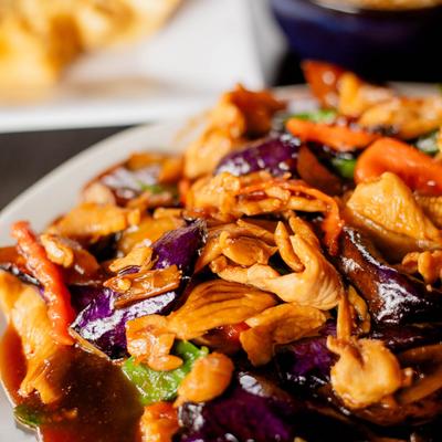 Szechwan Chicken, with eggplant, pea pods, mushrooms, and baby corn.
