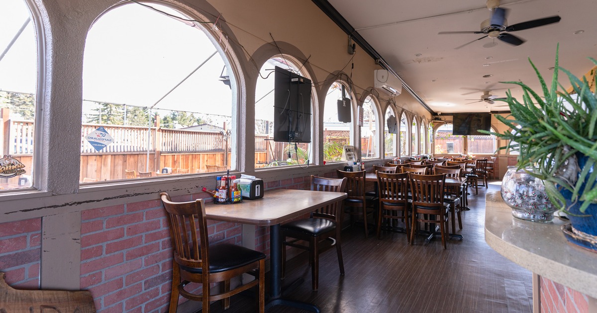 Interior space, dining area, dining tables lined up by the windows