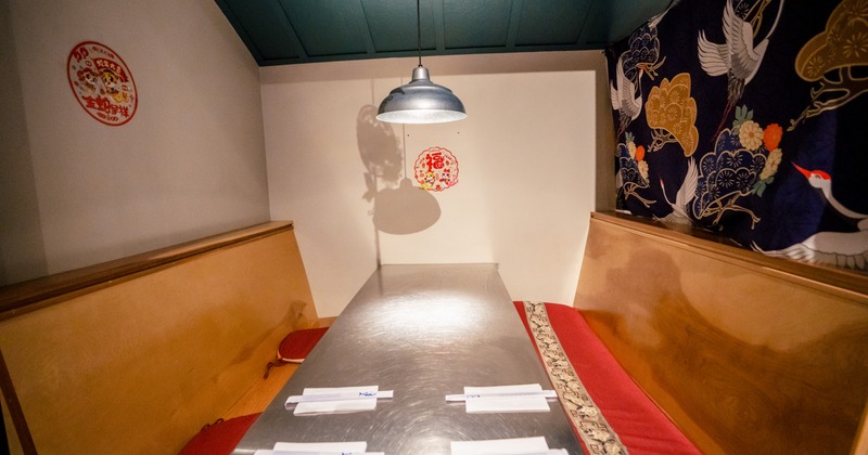 Interior, seating booth with wooden benches